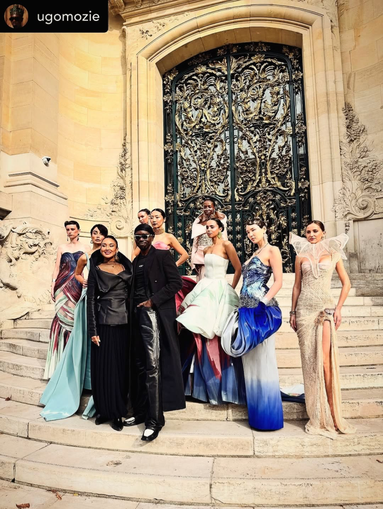 Stylist Ugo Mozie with Anaya models and Iuliia Bazhan outside Hôtel Le Marois in Paris